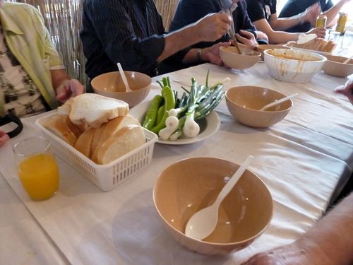 Picture 26 – . . . served with fresh bread, green onions and green peppers . . .