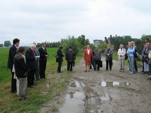 Picture 16 – At the commemoration for the dead following week-long rains, the terrain is nearly impassable . . .